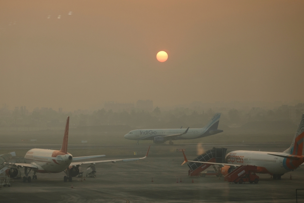 Over 100 Flights Cancelled at Delhi Airport as Dense Fog and Smog Grip the City