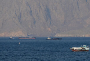 iran warns us to stay out of hormuz as trump pushes ship escort plan