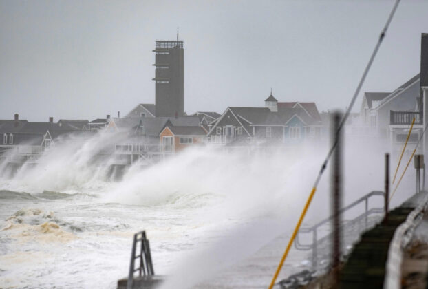 One dead and 60,000 without power as powerful Nor’easter batters US Northeast