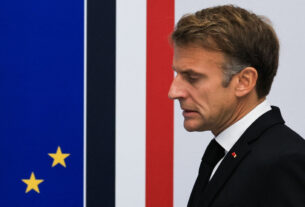 Macron under pressure after France protests leave nearly 1,000 police injured